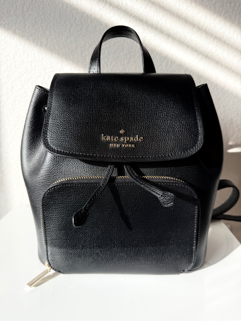Kate Spade Black Pebbled Leather Backpack Drawstring Flap Gold Hardware